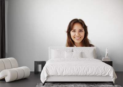 People, business, success and life goals concept. Successful beautiful young Hispanic female entrepreneur in formal shirt standing against white studio wall backgrounf with copy space for your text Wall mural