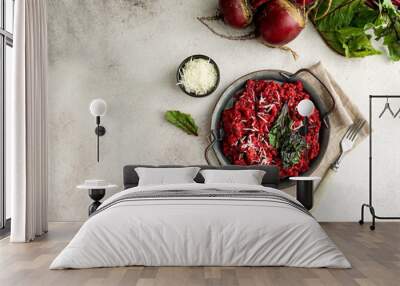 beetroot risotto with hard cheese, caramelized leaves,  dark black background Wall mural