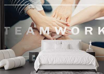 Panoramic teamwork business join hand together concept, Business team standing hands together, Volunteer charity work. People joining for cooperation success business. Wall mural