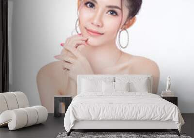 Portrait of attractive asian woman sitting smiling on white background. Healthy skin woman natural makeup beauty face concept. Using as your Product. Wall mural