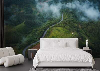 pathway on the mountain in the rain season at doi chiang rai thailand Wall mural