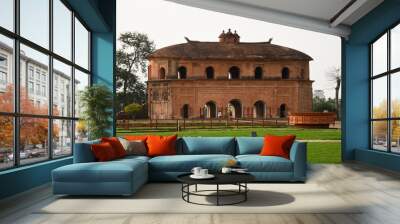 Rang Ghar is a two-storeyed building which once served as the royal sport.  Wall mural