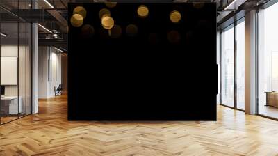 Abstract gold bokeh with black background Wall mural