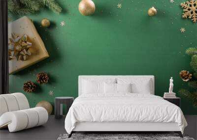 Christmas and new year background concept. Top view of Christmas gift box, christmas ball and snowflake on green background. Wall mural