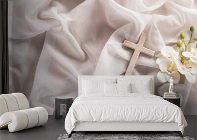 Good Friday and Holy week concept - A religious cross and flower on white fabric background. Wall mural