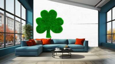 Happy St Patricks Day message on green paper clover and white wooden background Wall mural