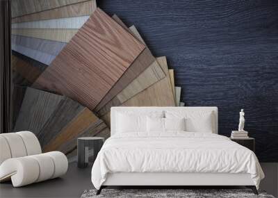 Laminate Wood Concept - Samples of laminate and vinyl floor tile on wooden Background wo Wall mural