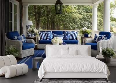 A cozy outdoor seating area with blue decor, perfect for relaxation and social gatherings. Wall mural