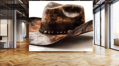 A rustic cowboy hat with a weathered texture and decorative band. Wall mural