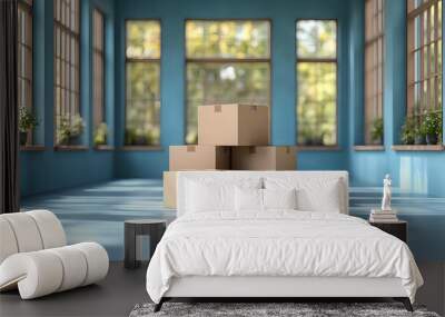 Four stacked cardboard boxes in a bright, empty room with windows. Wall mural