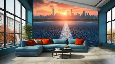 Empty road leading to a city skyline at sunset. Wall mural