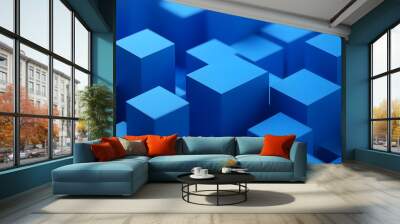 A close-up view of various blue geometric blocks arranged in a dynamic pattern. Wall mural