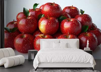 A pile of shiny red apples with green leaves, showcasing freshness and abundance. Wall mural