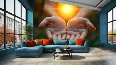 Open hands reaching up toward a bright light in the sky. Wall mural