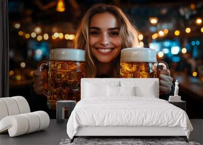 Woman joyfully holding two large beer mugs in a lively bar. Wall mural