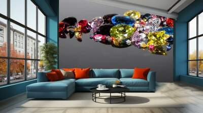 Colorful of different gemstones with space for text on dark background. Wall mural