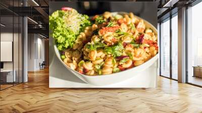 Pasta with fresh vegetables on white plate Wall mural