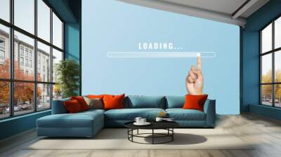 Man hand touching loading bar for countdown. Loading concept Wall mural