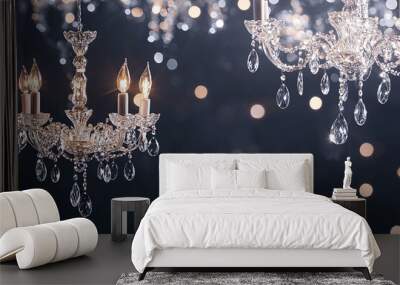 Two crystal chandeliers light up dark background with bokeh. Wall mural