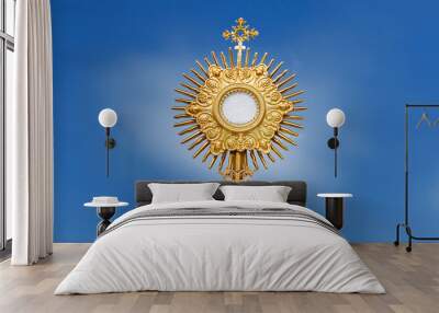 ostensory - catholic religious symbol on blue background Wall mural