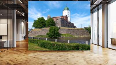 Sunny July day near the medieval Vyborg castle. Leningrad region, Russia Wall mural