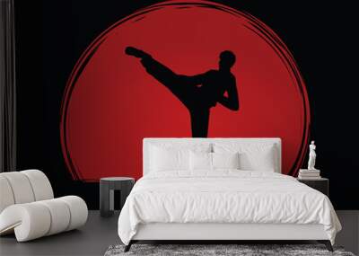 Kung fu pose, man kicking designed on sunset or sunrise background graphic vector.
 Wall mural