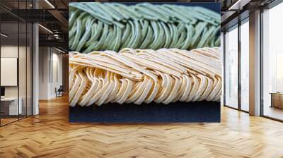 green and yellow healthy egg noodles close-up Wall mural