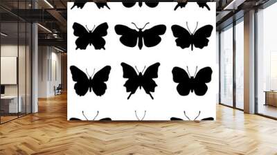 Black silhouettes of butterflies on a white background, vector Wall mural