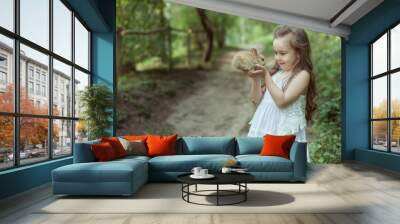 Cute girl in the fairy forest. Wall mural