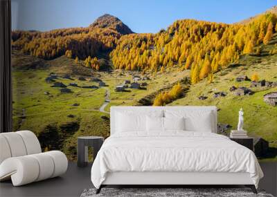 Valtellina (IT) - autumnal aerial view of the typical mountain huts at the Arcoglio alp Wall mural