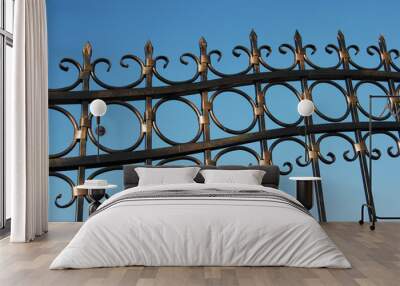 Metal fence over blue sky Wall mural