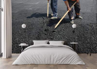 Roadworks, worker with  shovel at asphalt Wall mural