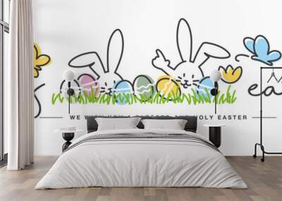 Happy Easter we wish you a holy and blessed Easter handwritten art line design of cute smiling Easter bunny and eggs in grass egg hunt on white background great for Easter Card, banner, wallpapers Wall mural