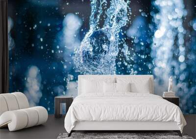 The gush of water of a fountain. Splash of water in the fountain, abstract image Wall mural