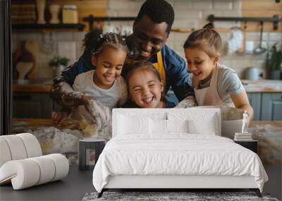 Interracial family cooking with flour, African-American father and his three daughters laughing and enjoying a day together Wall mural