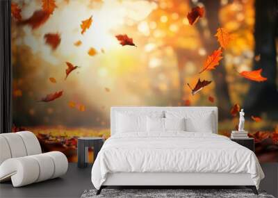 Autumn leaves falling down against a colorful forest background in fall. Golden and brown themed seasonal landscape. Nature concept.  Wall mural