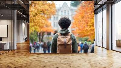 Black student with a brown backpack at school or university campus ready for learning, goals or targets. Education, scholarship and learning concept. Wall mural