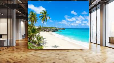 Bottom Bay, Barbados - Paradise beach on the Caribbean island of Barbados. Tropical coast with palms hanging over turquoise sea. Panoramic photo of beautiful landscape. Wall mural