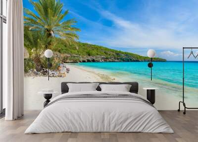 Cas Abao beach - paradise white sand Beach with blue sky and crystal clear blue water in Curacao, Netherlands Antilles, a Caribbean tropical Island Wall mural