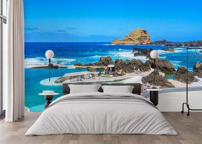 Natural volcanic swimming lagoon pools at Porto Moniz, travel destination for vacation, Madeira island, Portugal Wall mural