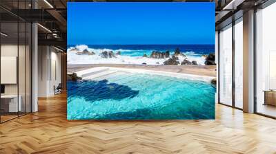 Natural volcanic swimming lagoon pools at Porto Moniz, travel destination for vacation, Madeira island, Portugal Wall mural