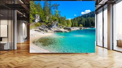 Paradise beach in bay of Cauma Lake (Caumasee) with crystal blue water in beautiful mountain landscape scenery at Flims, Graubuenden - Switzerland Wall mural