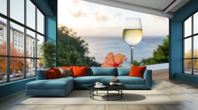 Romantic moments in summer at sunset with two glasses of white wine - Relaxing romantic holiday concept with beautiful view of tropical beach and coast Wall mural