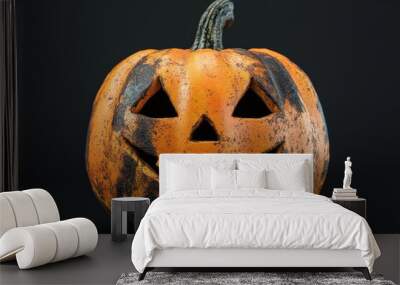 Funny Jack O Lantern with dark black background. Carved pumpkin with a scary face at Halloween. Happy Halloween! Wall mural