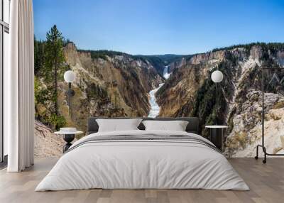 panoramic picture of the lower falls waterfall on a sunny day in the yellowstone national park, wyoming, united states of america Wall mural