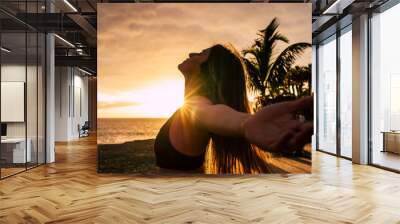 Closeup portrait of active healthy beautiful woman enjoying the sunset and the sport - people having relax time outdoor after activity exercises class or session - breathe and happiness Wall mural