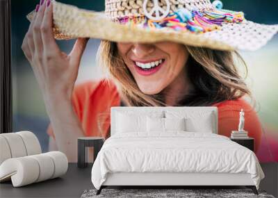 Smile and perfect teeth beautiful young woman laughing and enjoying outdoor - trendy hat and fashion caucasian female portrait - happiness and joyful people concept lifestyle Wall mural