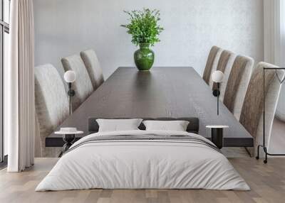 Minimalist dining room with dark wood table and high back chairs Wall mural