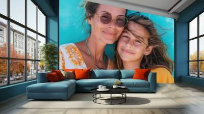 Mother and daughter together smiling on solid minimalism background Wall mural