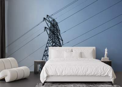 Shilouette of an electric pylon with perspective from below Wall mural